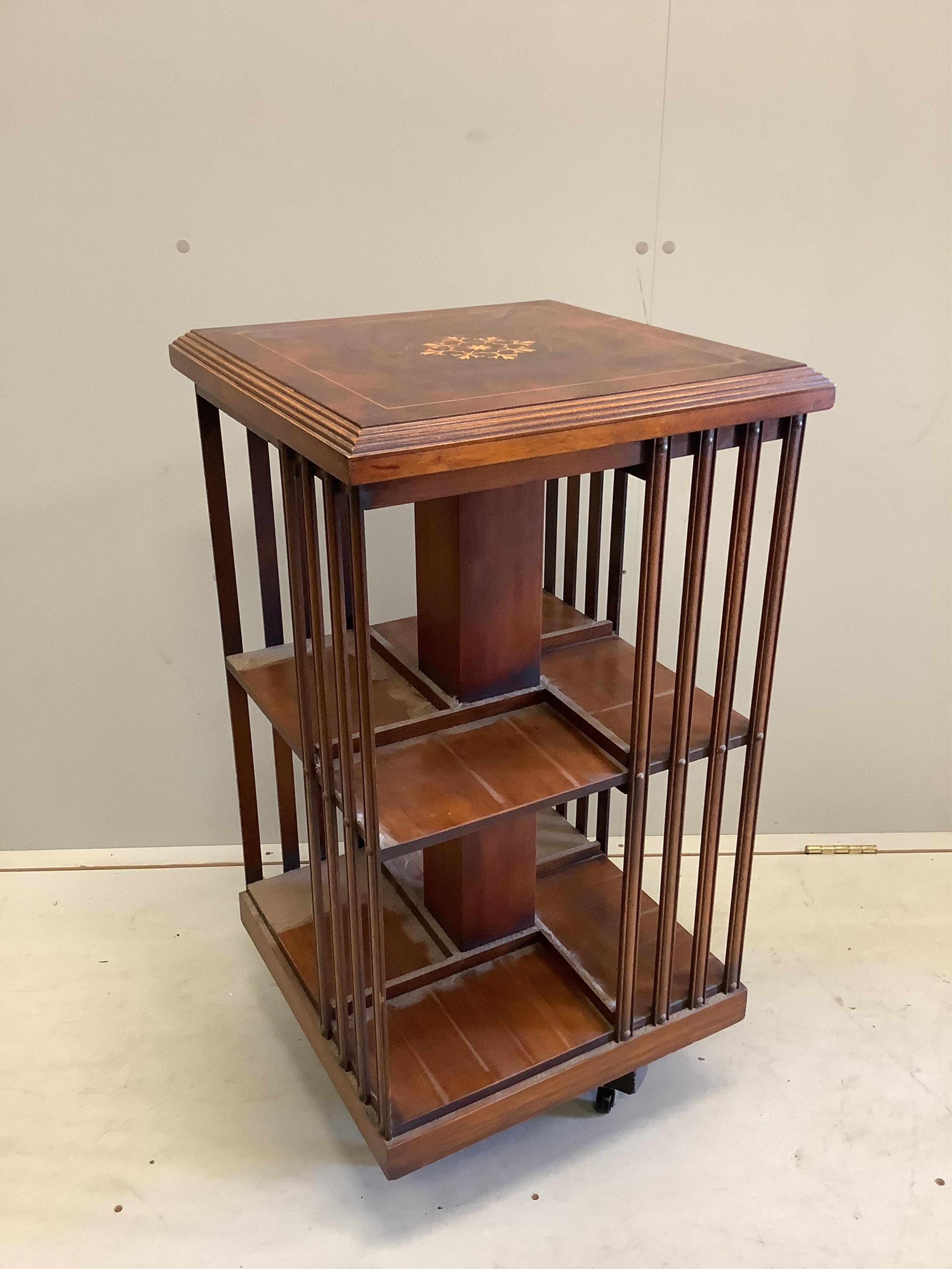 A modern burr walnut square two tier revolving bookcase, width 46cm, depth 46cm, height 85cm